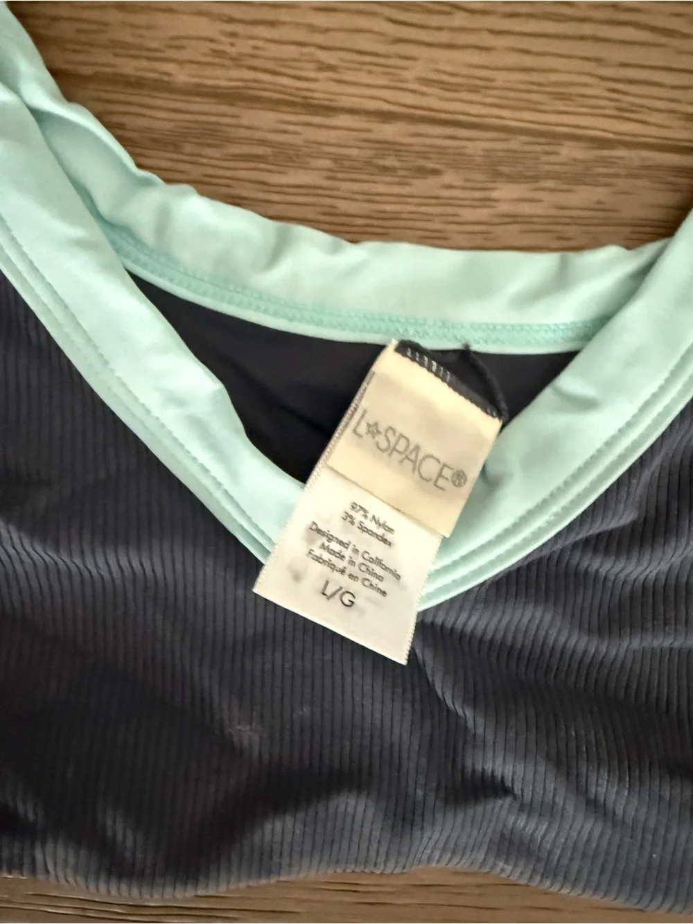 Women’s L-space Navy Blue Swim Set with Light Blue and Orange Trim. Size S/L